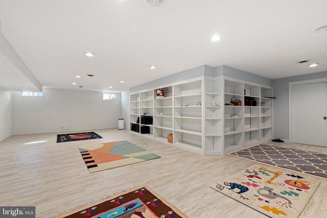 interior space with recessed lighting and wood finished floors