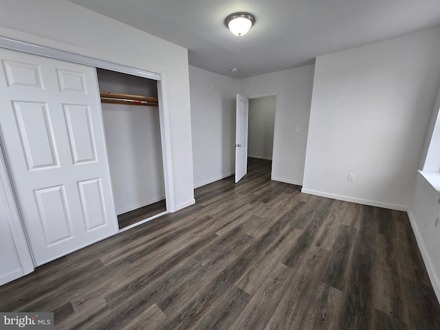 330 E State St, Trenton, NJ 08608 - unfurnished bedroom featuring dark wood-type flooring and a closet