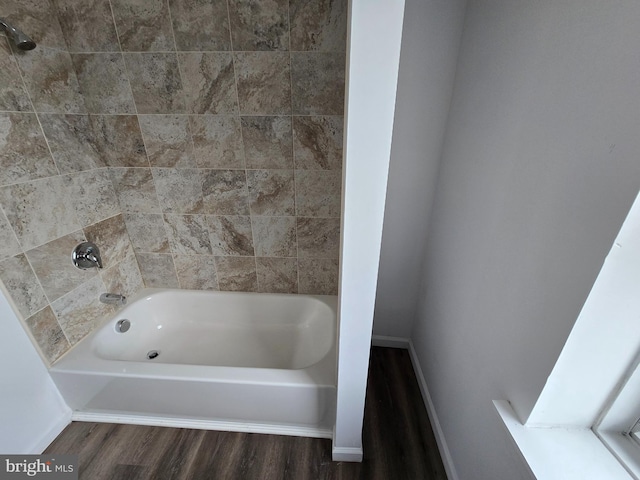 330 E State St, Trenton, NJ 08608 - full bathroom featuring wood finished floors and tub / shower combination