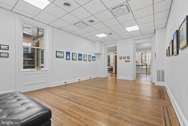 interior space featuring visible vents and wood finished floors