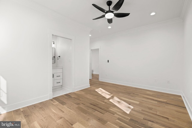 unfurnished bedroom with baseboards, ornamental molding, recessed lighting, light wood-style flooring, and ensuite bathroom