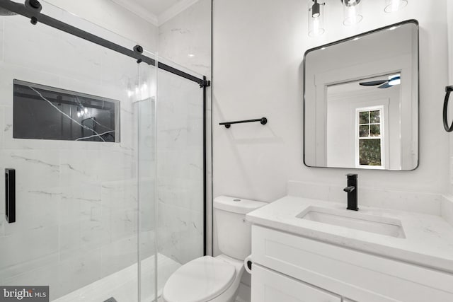 full bathroom featuring a marble finish shower, toilet, vanity, and ornamental molding