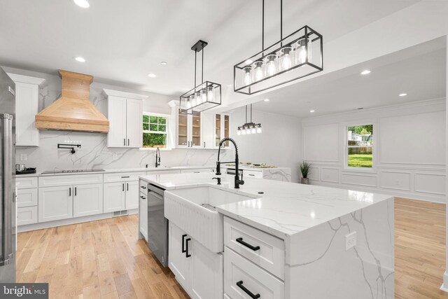4507 Muncaster Mill Rd, Rockville, MD 20853 - kitchen featuring custom range hood, stainless steel dishwasher, black electric stovetop, white cabinets, and recessed lighting