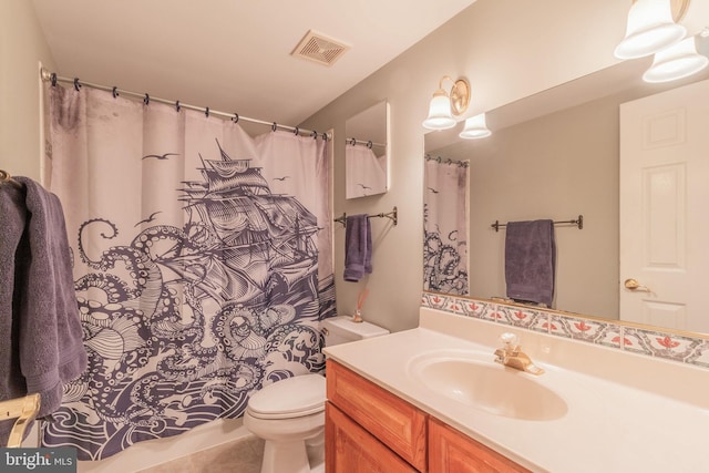 full bathroom with visible vents, toilet, vanity, and tile patterned flooring