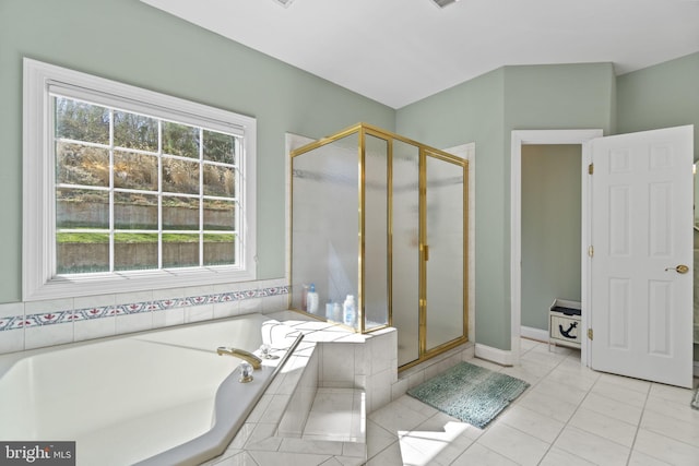 full bath with a bath, tile patterned flooring, and a shower stall