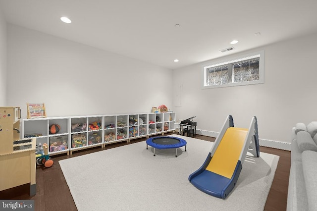 game room with recessed lighting, wood finished floors, visible vents, and baseboards