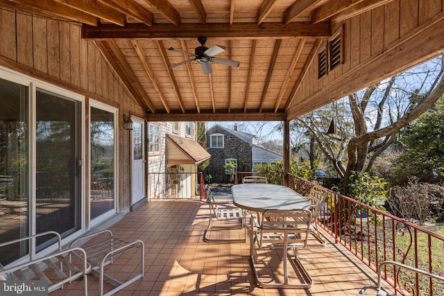 deck featuring outdoor dining area