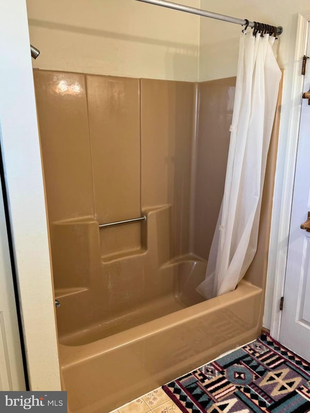 full bathroom with shower / bathtub combination with curtain