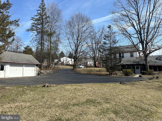 view of yard with a garage