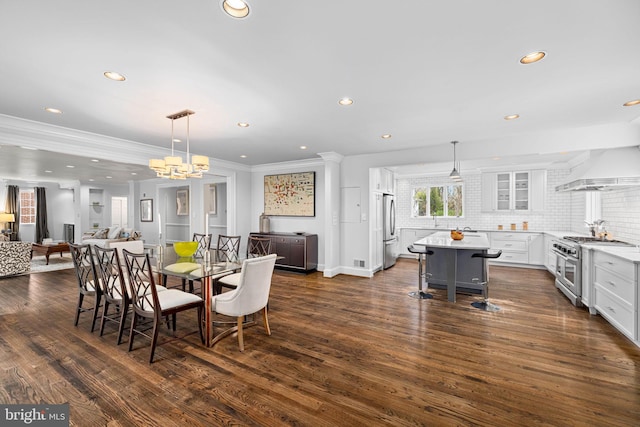 dining room featuring visible vents, recessed lighting, crown molding, and dark wood-style flooring