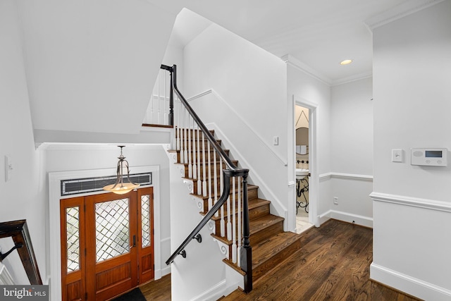 entryway with stairs, dark wood-type flooring, recessed lighting, and baseboards