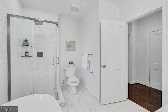 full bathroom with toilet, baseboards, marble finish floor, and a stall shower