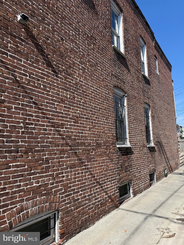 view of home's exterior featuring brick siding