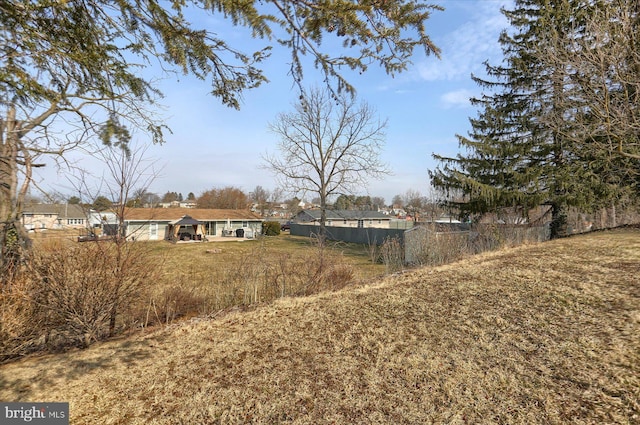 view of yard featuring fence