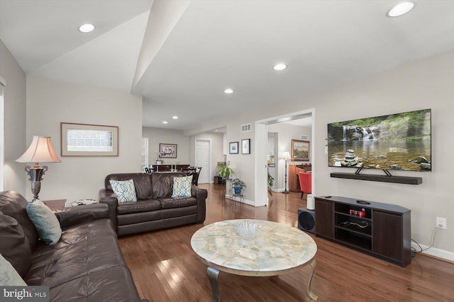 living room featuring visible vents, recessed lighting, wood finished floors, and baseboards