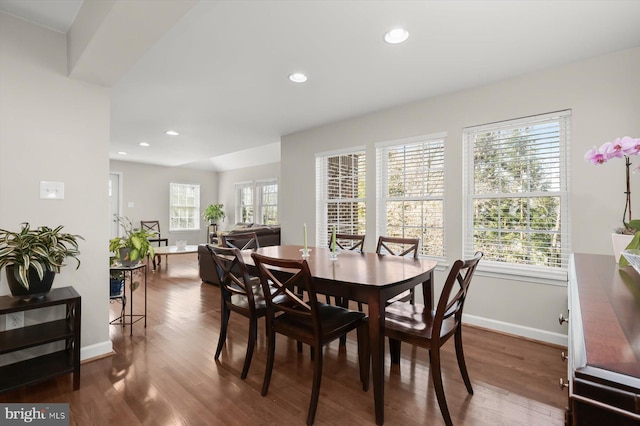 dining space featuring recessed lighting, baseboards, and dark wood-style flooring