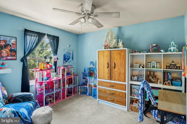 rec room featuring a ceiling fan and carpet flooring