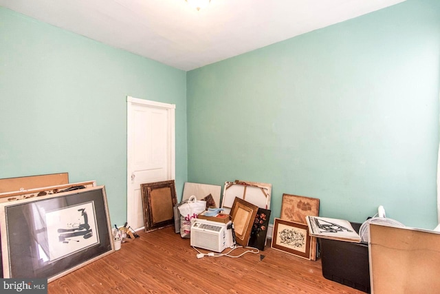 miscellaneous room featuring wood finished floors