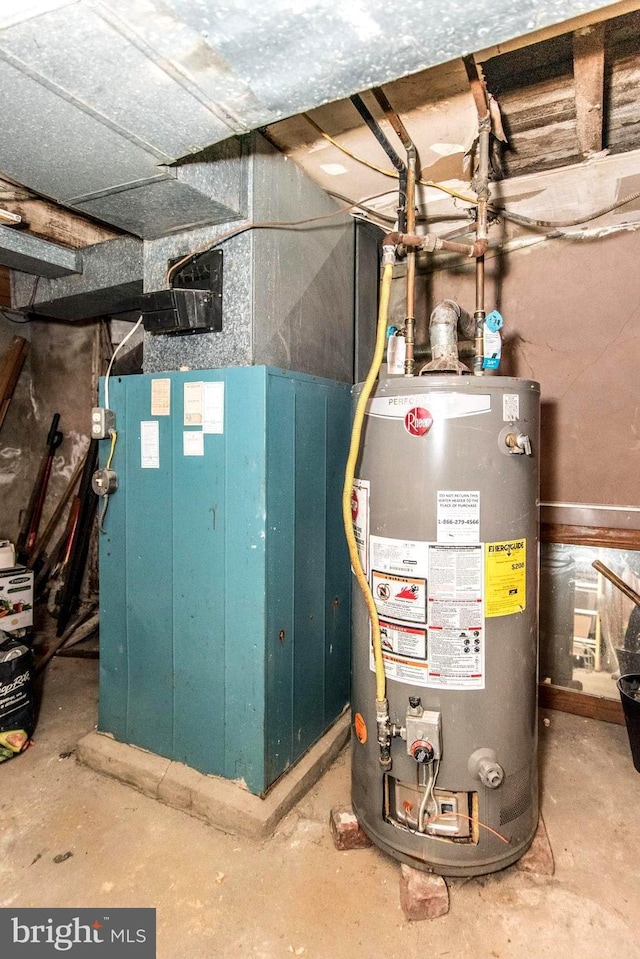 utility room with water heater