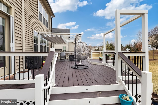 wooden terrace featuring a pergola