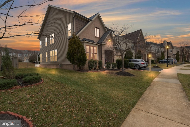 view of front of home featuring a yard