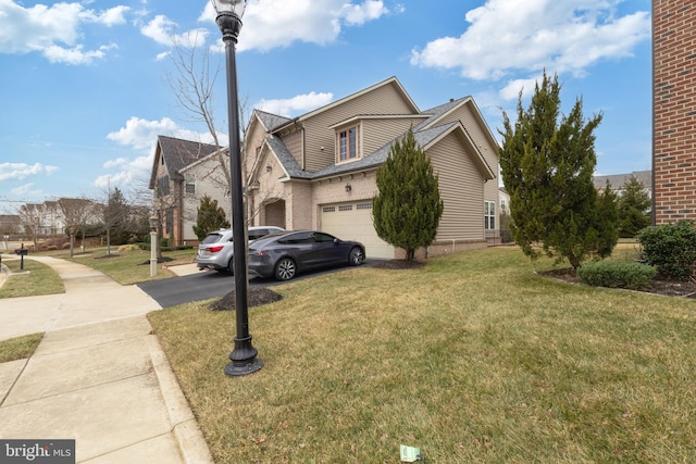 view of property exterior with driveway, a lawn, and brick siding