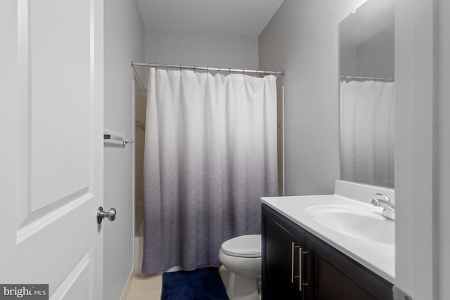 full bathroom with tile patterned floors, toilet, vanity, and shower / bathtub combination with curtain