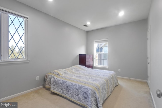 bedroom with visible vents, recessed lighting, baseboards, and carpet floors