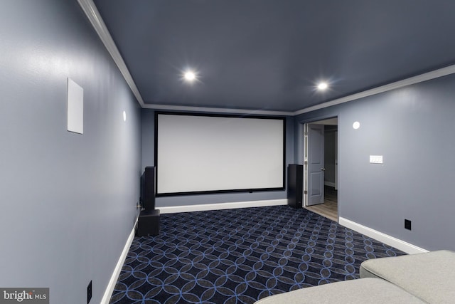 carpeted home theater with recessed lighting, crown molding, and baseboards