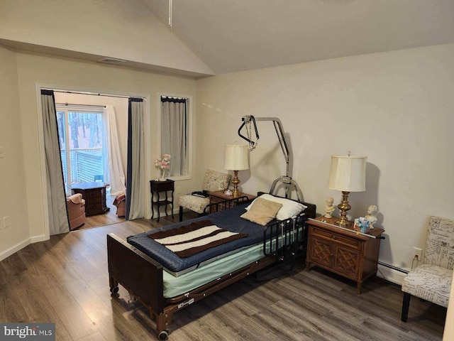 100 Deerfield Dr, Manahawkin, NJ 08050 - bedroom with access to exterior, baseboard heating, wood finished floors, and lofted ceiling