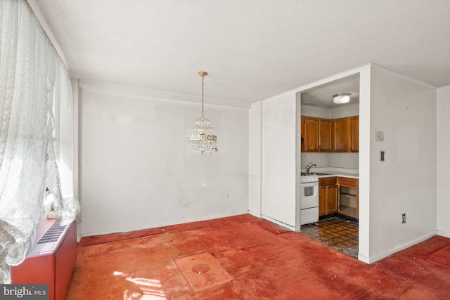 dining space with baseboards, a textured ceiling, an inviting chandelier, and carpet floors