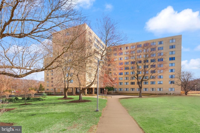 view of community with a lawn