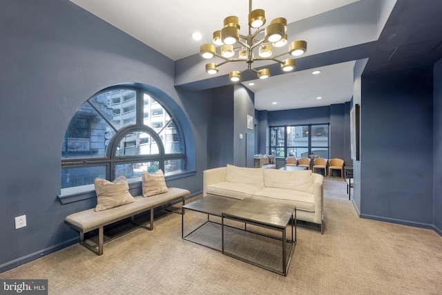 living area featuring recessed lighting, baseboards, carpet floors, and a chandelier