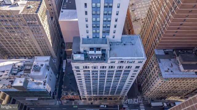 birds eye view of property with a city view