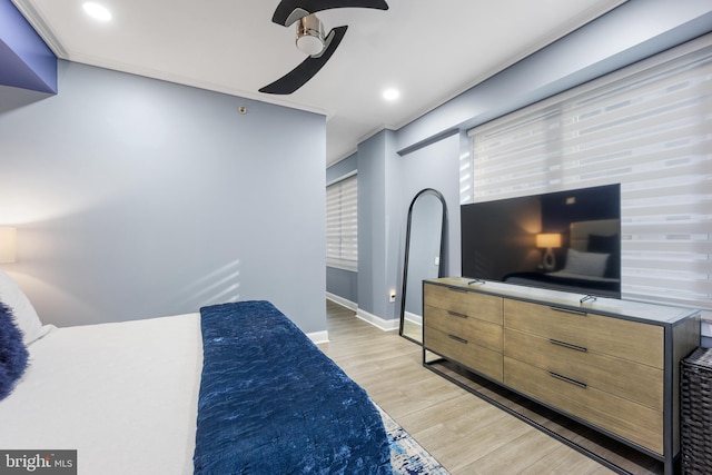 bedroom with recessed lighting, baseboards, light wood-style flooring, and ceiling fan