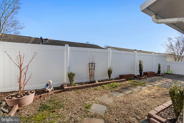 view of yard featuring a fenced backyard