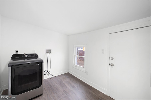 laundry room featuring laundry area, washer / clothes dryer, baseboards, and dark wood-style flooring