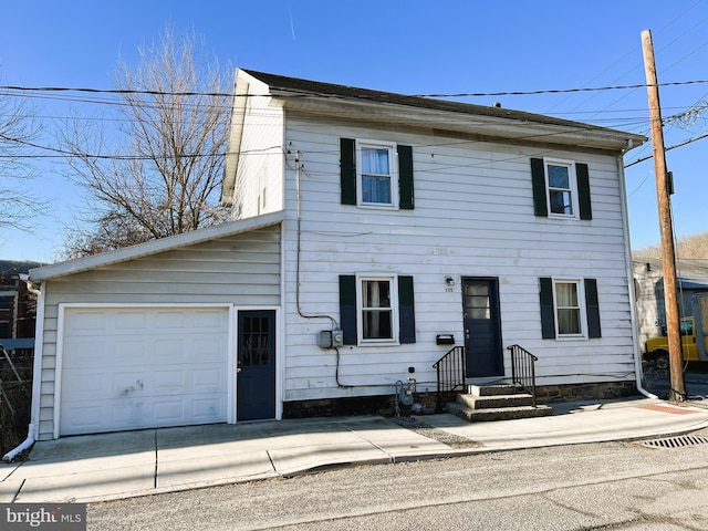 view of front of home with concrete driveway