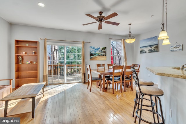 dining space with a wealth of natural light, recessed lighting, light wood-type flooring, and ceiling fan