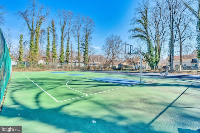 view of sport court with community basketball court and fence