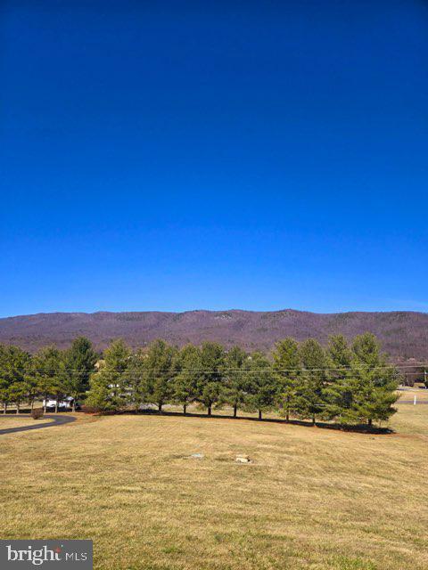 property view of mountains with a rural view