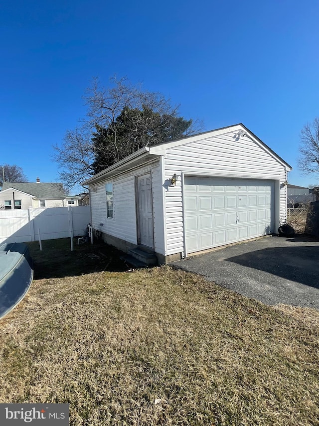 detached garage with fence