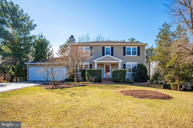 view of front of house featuring driveway, an attached garage, a chimney, and a front lawn