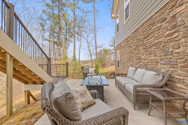 view of patio featuring stairway and an outdoor hangout area