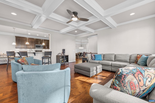 living area with beamed ceiling, dark wood-type flooring, and coffered ceiling