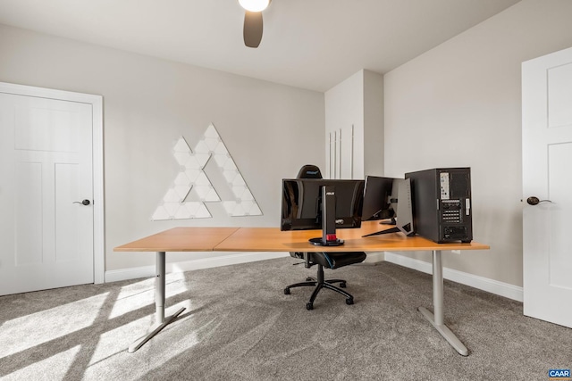 office with baseboards, carpet, and a ceiling fan