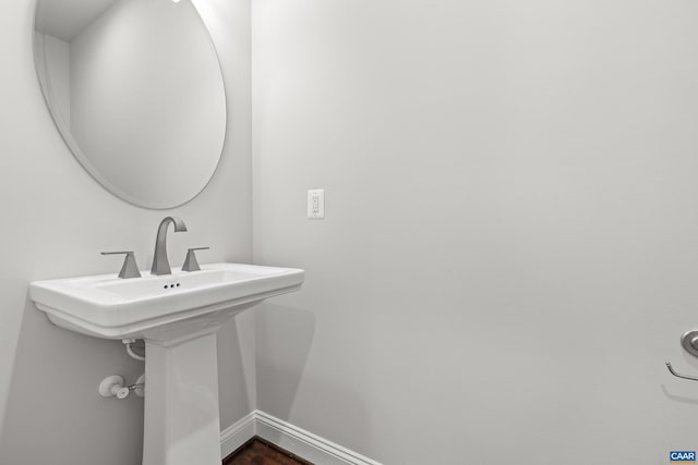 bathroom featuring baseboards