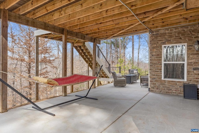 view of patio / terrace featuring stairway