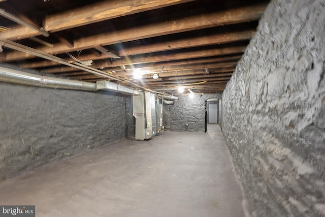 unfinished basement with heating unit