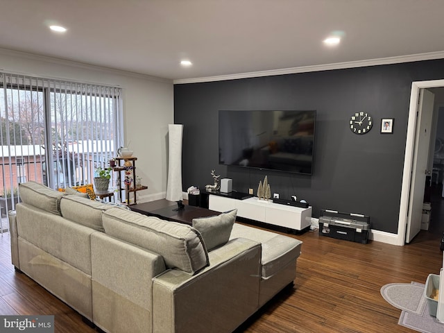 living room with dark wood finished floors, baseboards, and ornamental molding